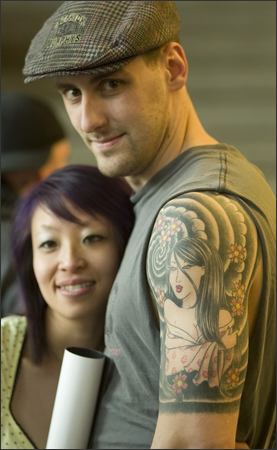 27 shows off his Geisha tattoo which they thought looked like Lin